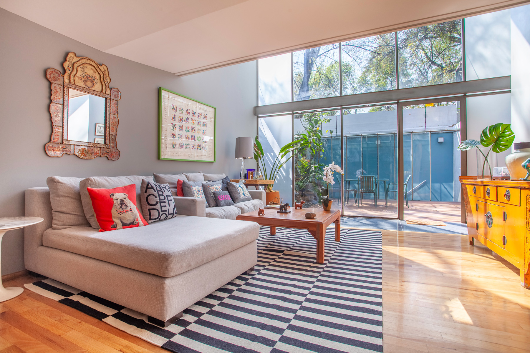 Peaceful Townhouse — open living space with double-height windows
